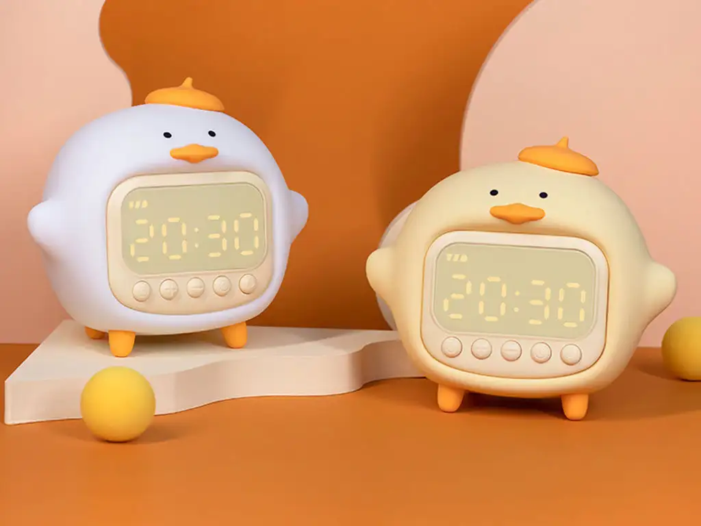 picture چراغ خواب سیلیکونی و ساعت زنگ‌دار دیجیتالی فانتزی رومیزی C15 Cartoon Duck Alarm Clock Silicone Night Light